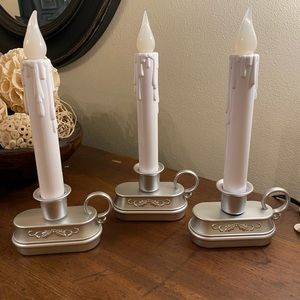 Three battery operated flickering candles (batteries not included)